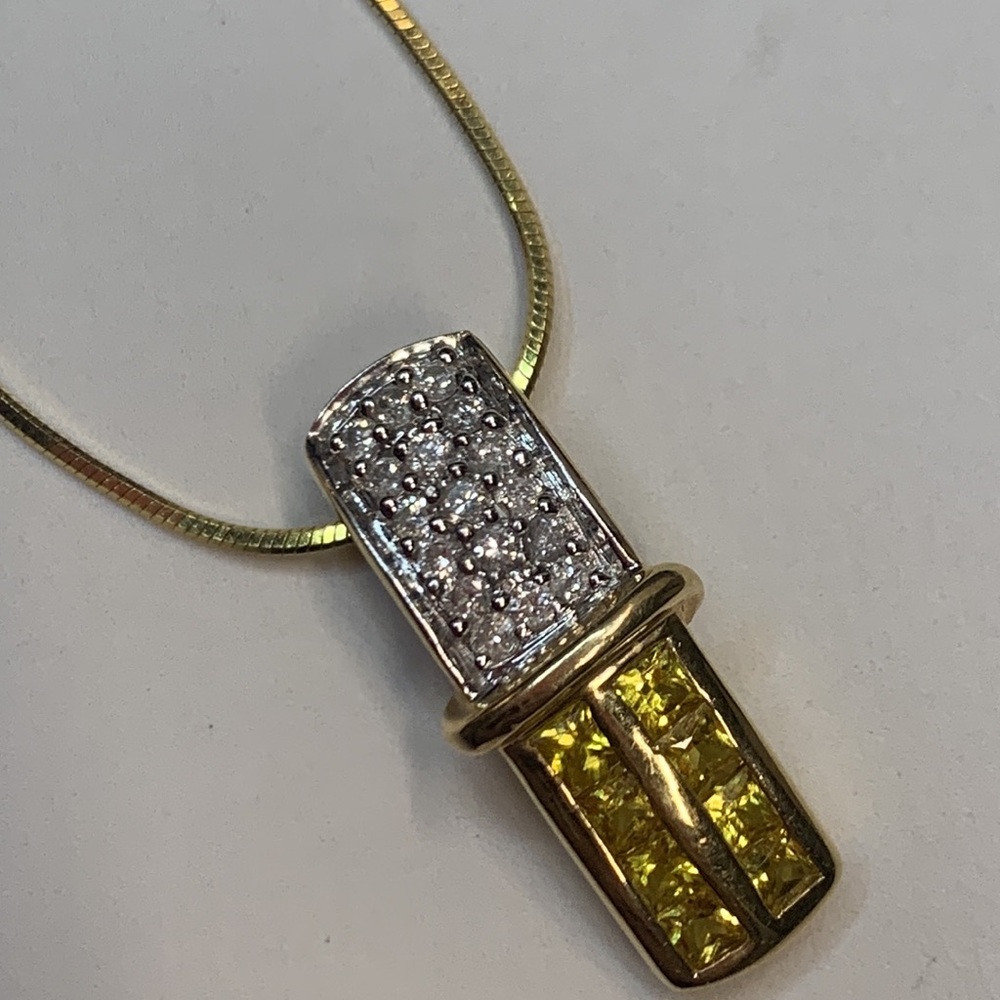 14k gold pendant with white diamonds